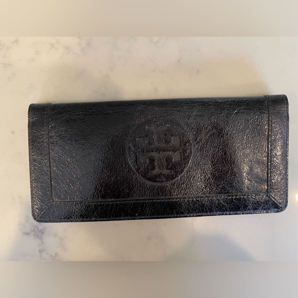 TORY BURCH Black Leather magnetic close clutch. Black logo.Excellent Condition.